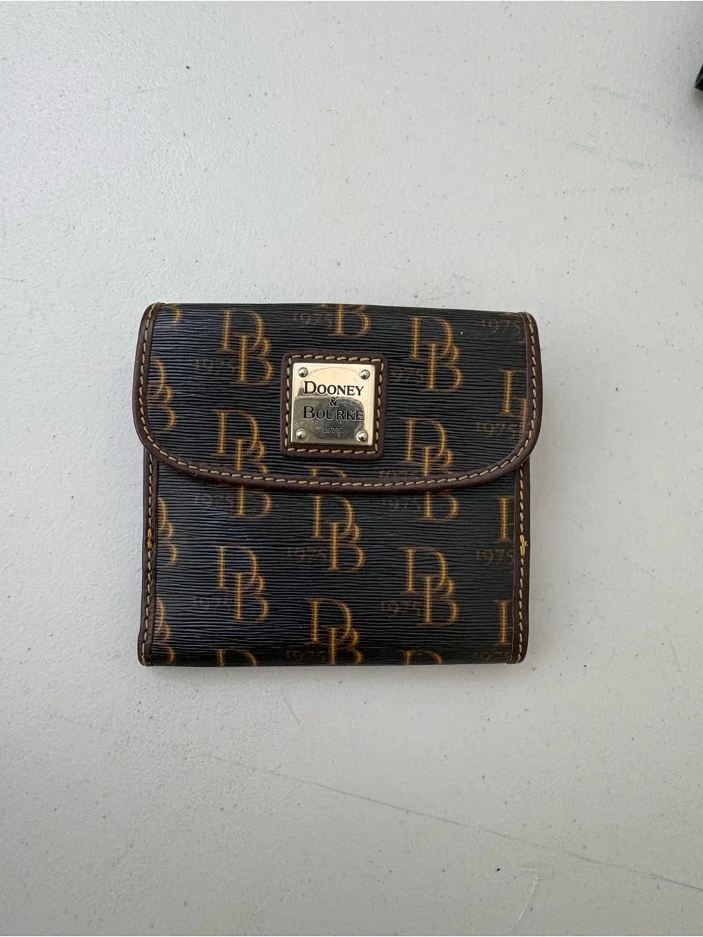 Dooney & Bourke Dark Brown Monogram Fold Wallet with Gold Logo Plate